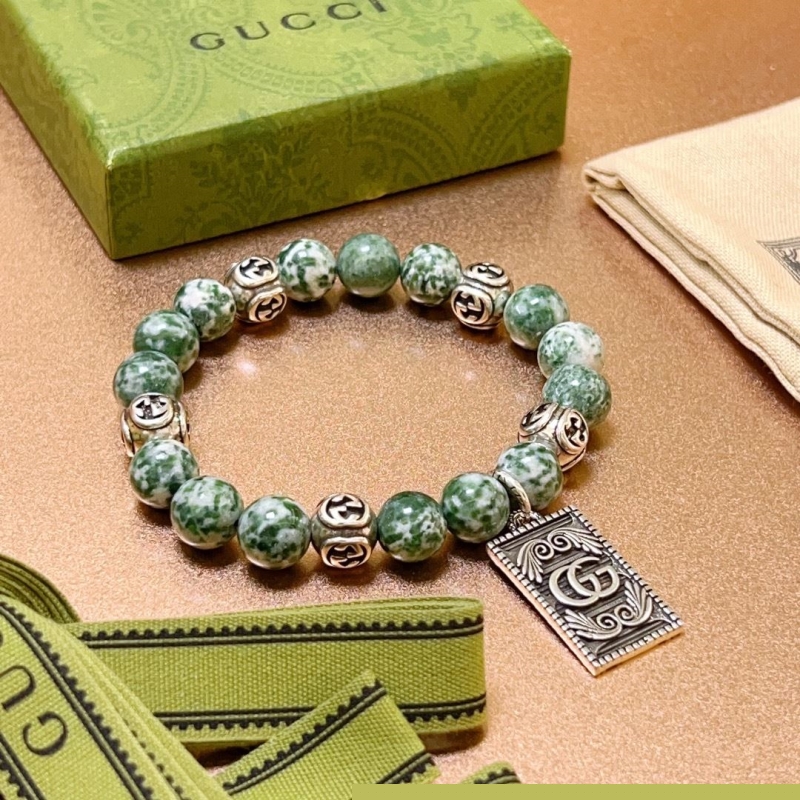 G*u*i bracelets